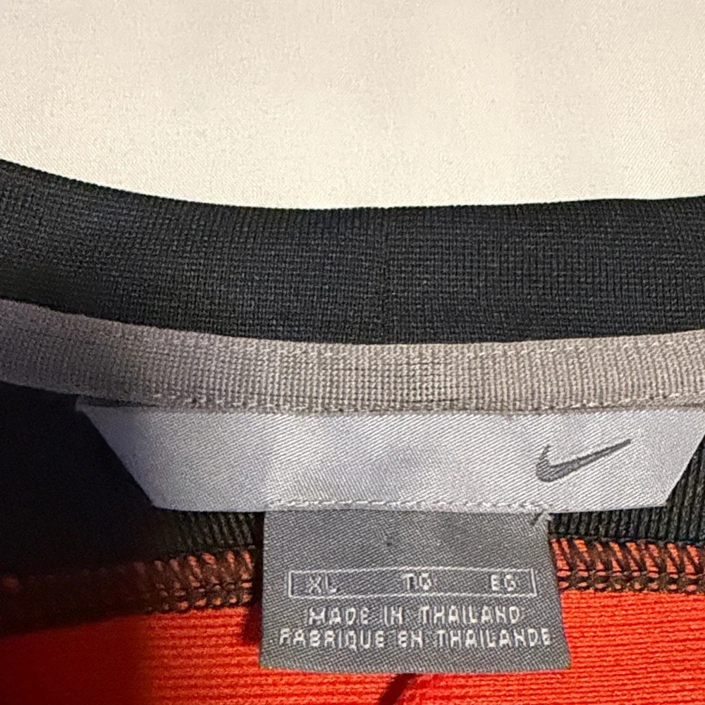 Nike Men’s Long-Sleeve Athletic Shirt in Charcoal with Orange Panels
